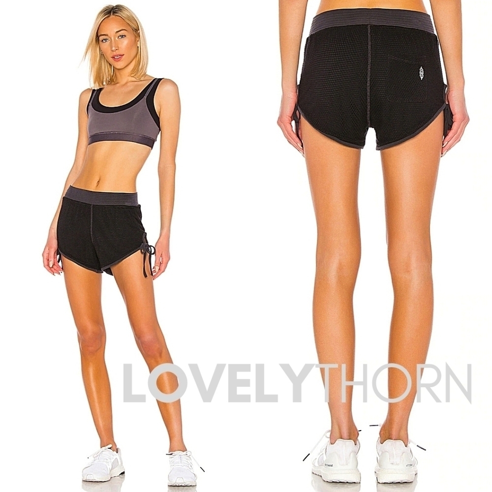 FREE PEOPLE // ltd ed surf break lined mesh high waist side tie black shorts